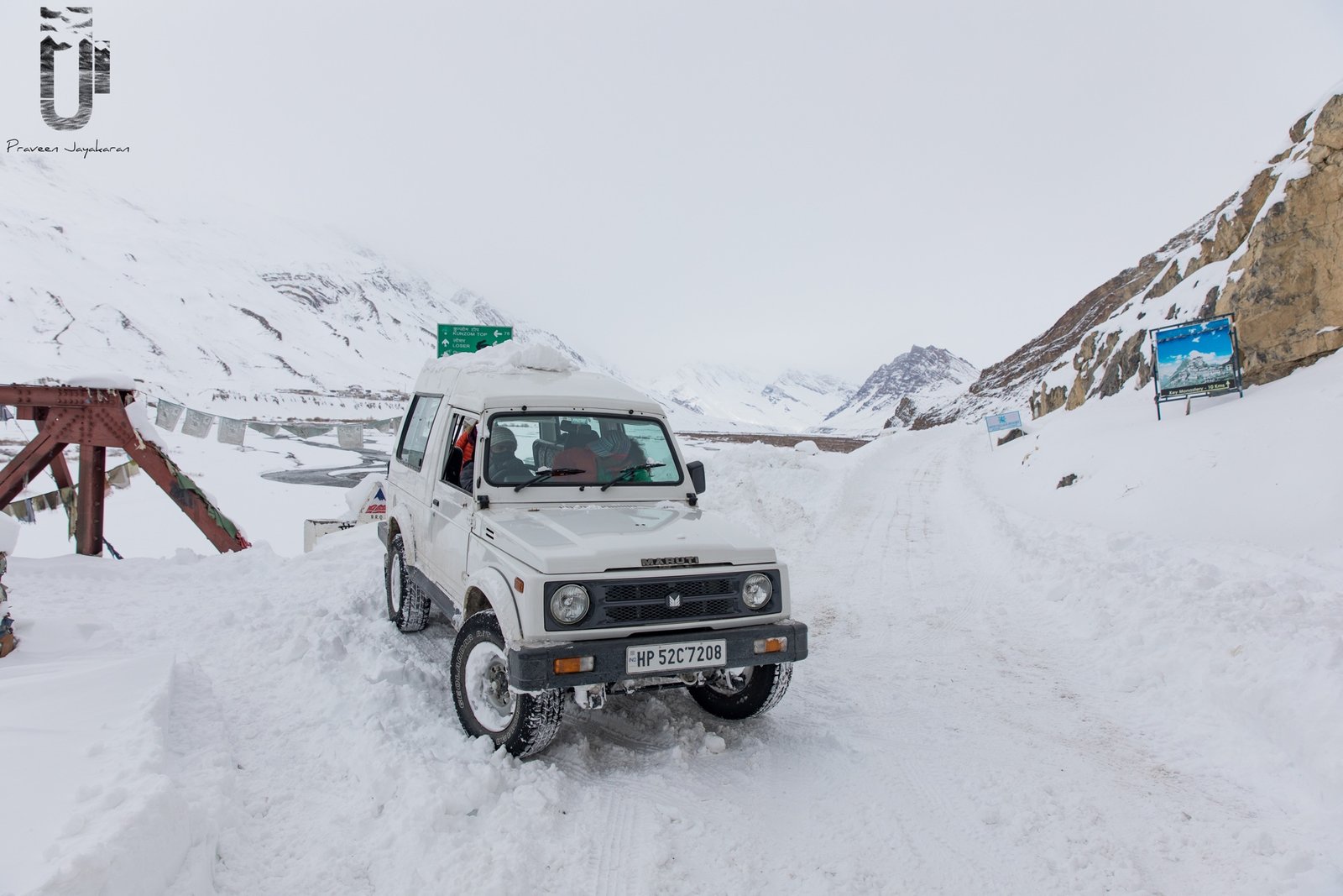 4WD vehicle on snowy mountain pass en route to Spiti Valley